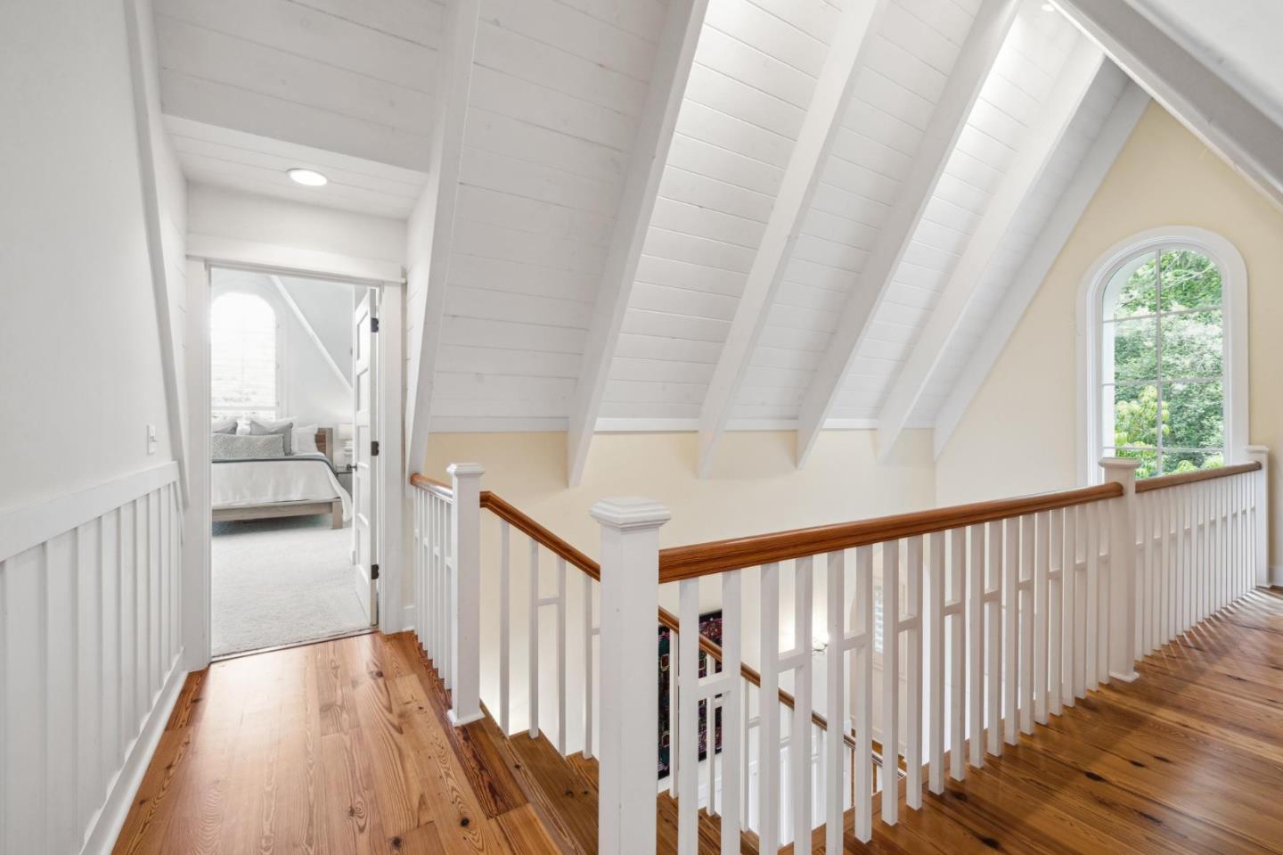 23865 Fairfield Place Carmel, CA 93923 - Photo 28 of 58 a view of a hallway view with wooden floor and staircase