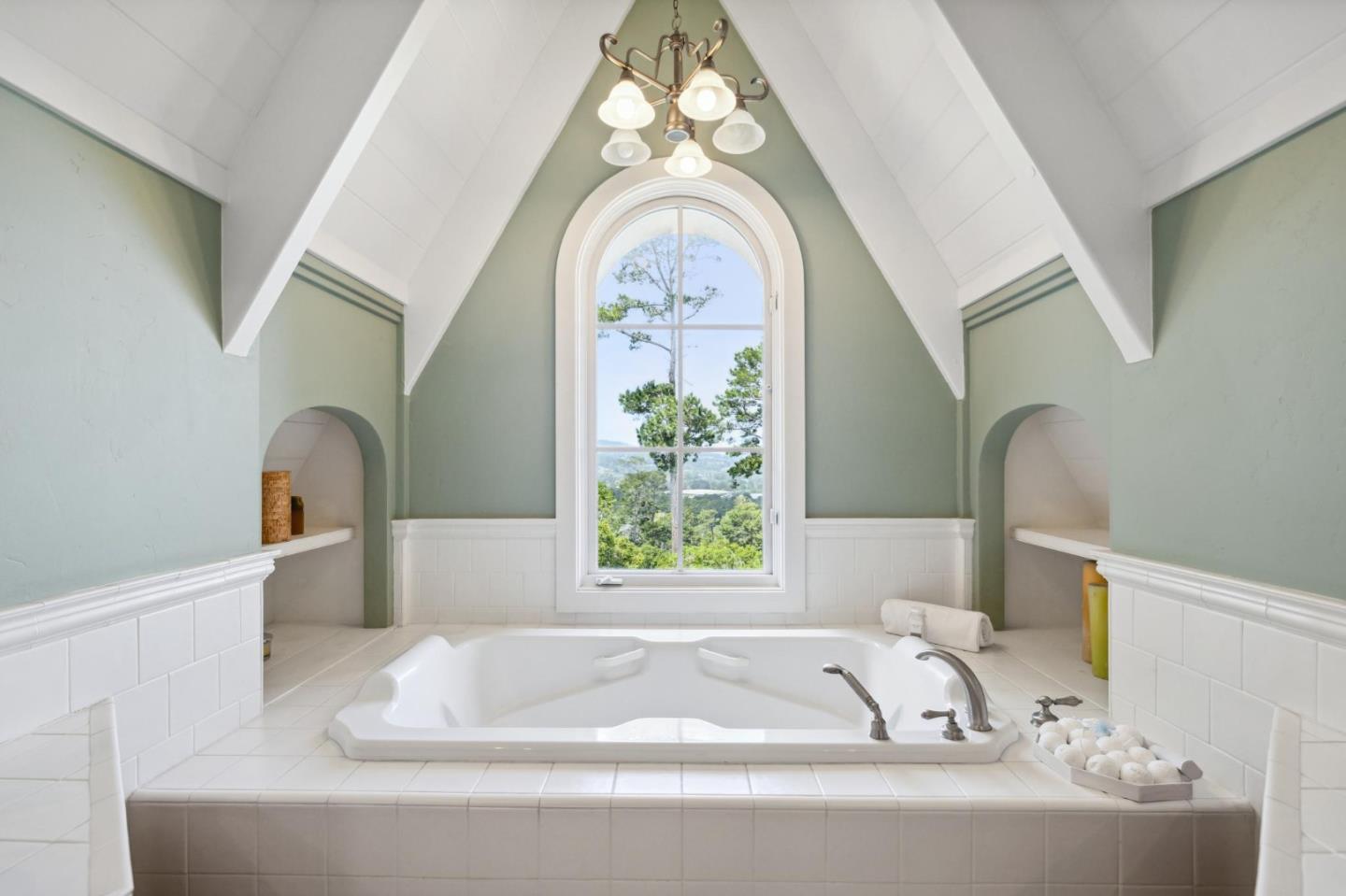 23865 Fairfield Place Carmel, CA 93923 - Photo 35 of 58 a white bath tub sitting in a bathroom next to a window