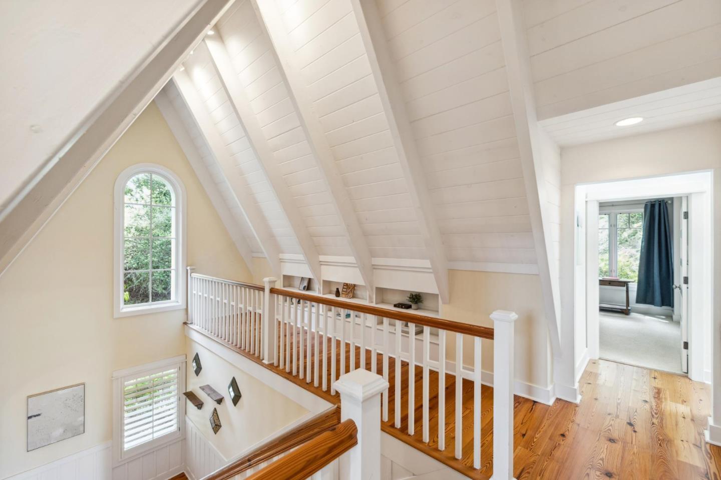 23865 Fairfield Place Carmel, CA 93923 - Photo 38 of 58 a view of a hallway with windows and stairs