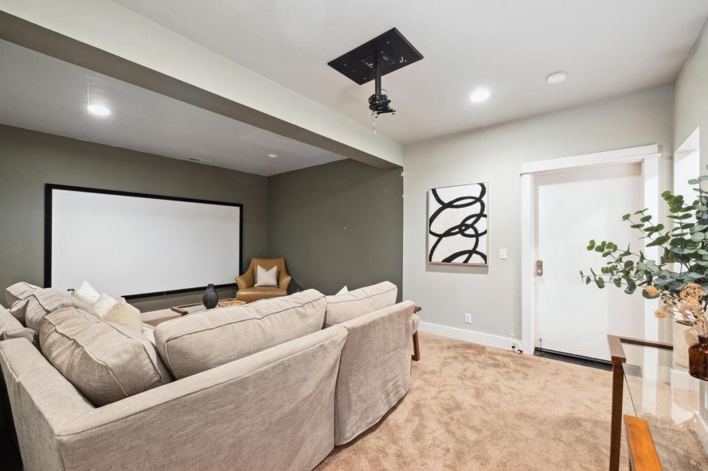 23865 Fairfield Place Carmel, CA 93923 - Photo 47 of 58 a living room with furniture and a potted plant