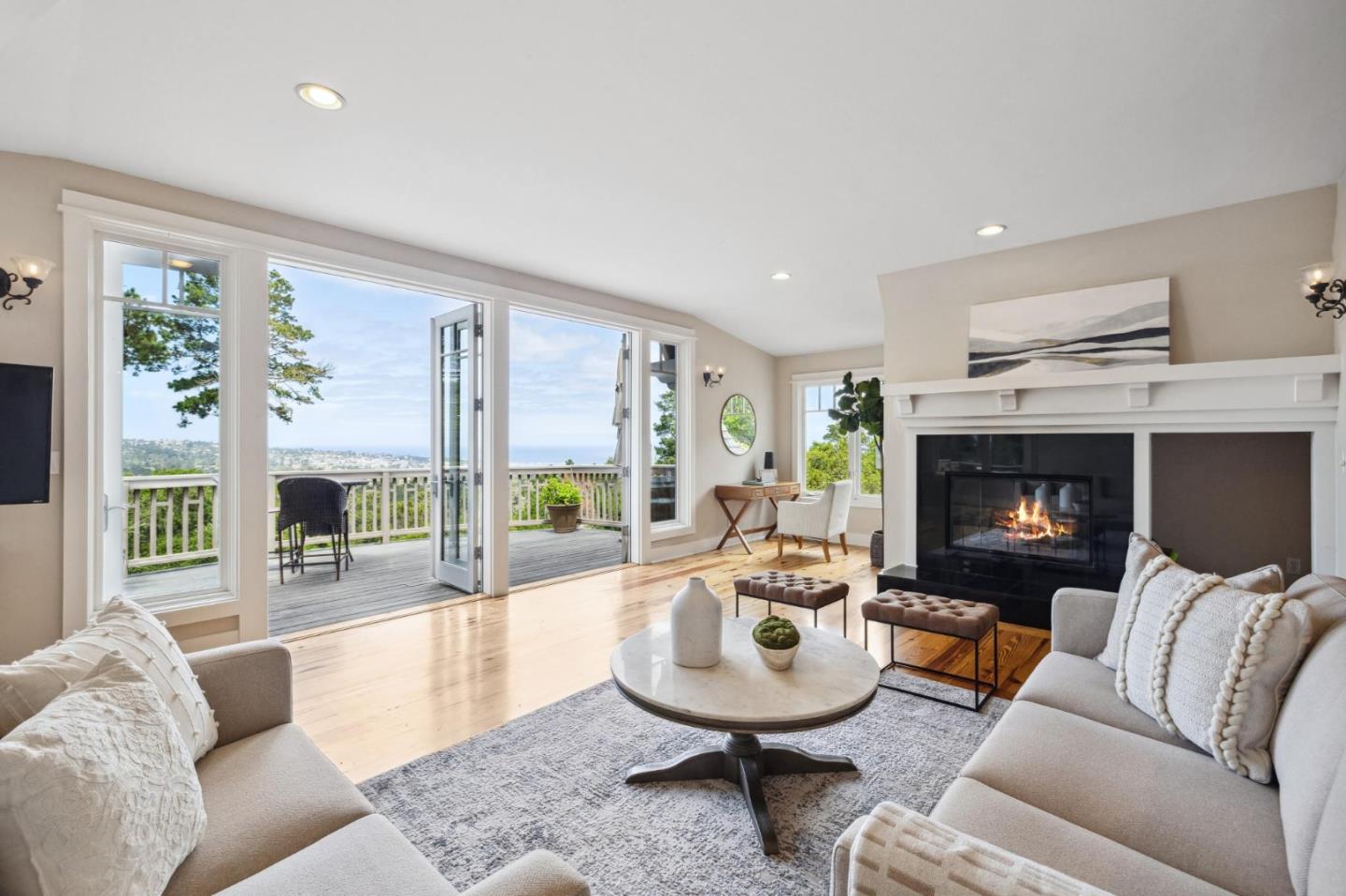 23865 Fairfield Place Carmel, CA 93923 - Photo 5 of 58 a living room with furniture and a fireplace