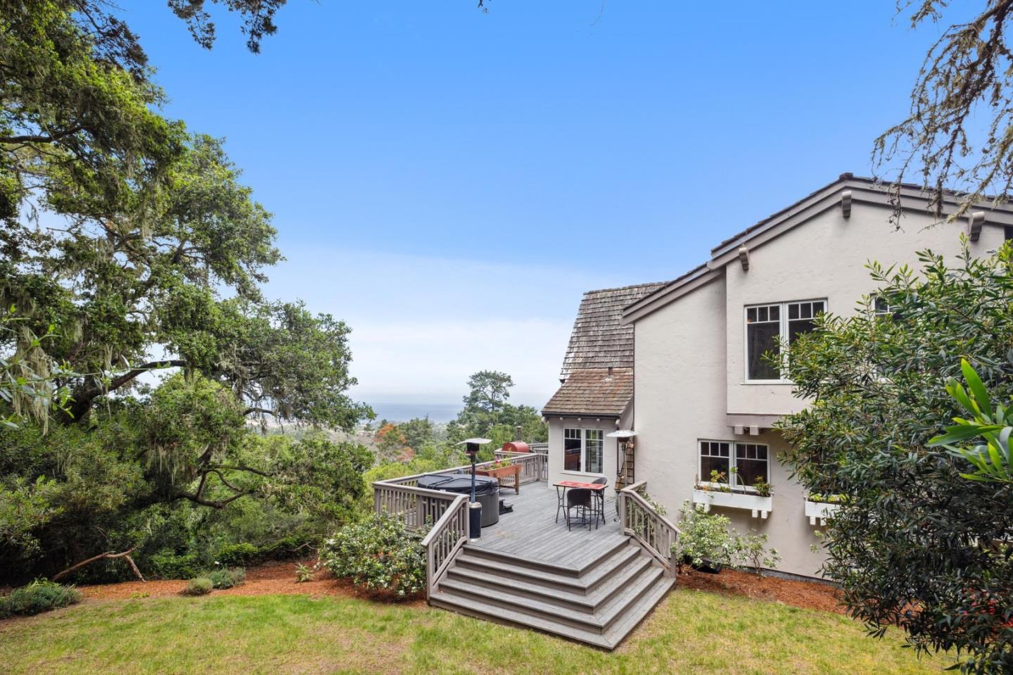 23865 Fairfield Place Carmel, CA 93923 - Photo 51 of 58 a view of a patio with couches table and chairs and potted plants