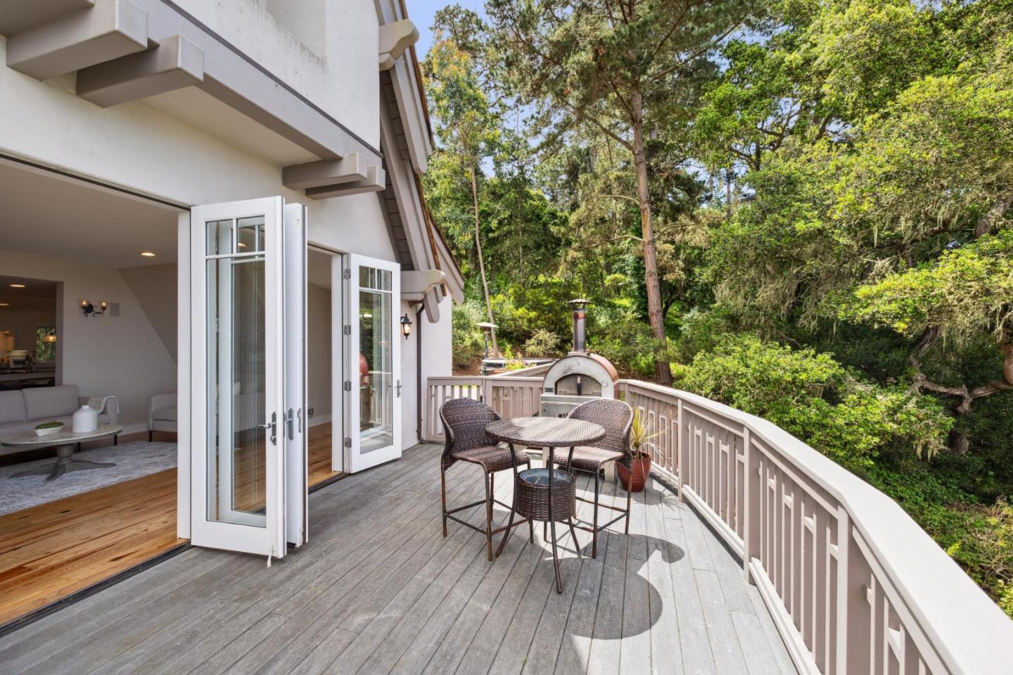 23865 Fairfield Place Carmel, CA 93923 - Photo 9 of 58 a balcony with wooden floor table and chairs