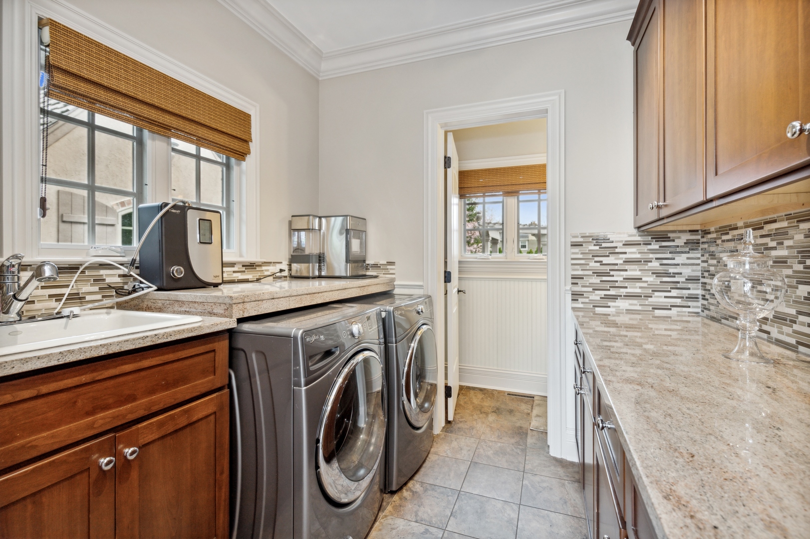 2770 Grace Road Northbrook, IL 60062 - Photo 18 of 51 a utility room with cabinets washer and dryer