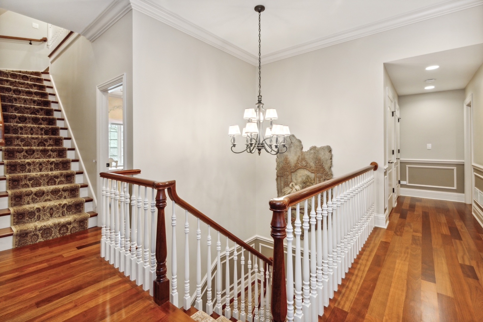 2770 Grace Road Northbrook, IL 60062 - Photo 20 of 51 a view of a hallway with wooden floor and staircase