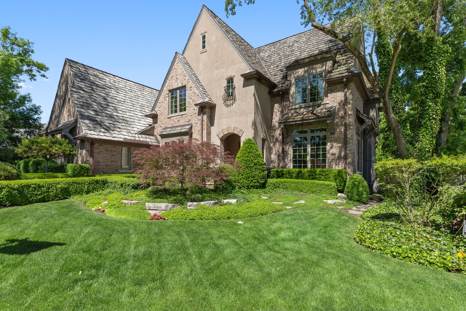 2770 Grace Road Northbrook, IL 60062 - Photo 2 of 51 front view of a house with a yard
