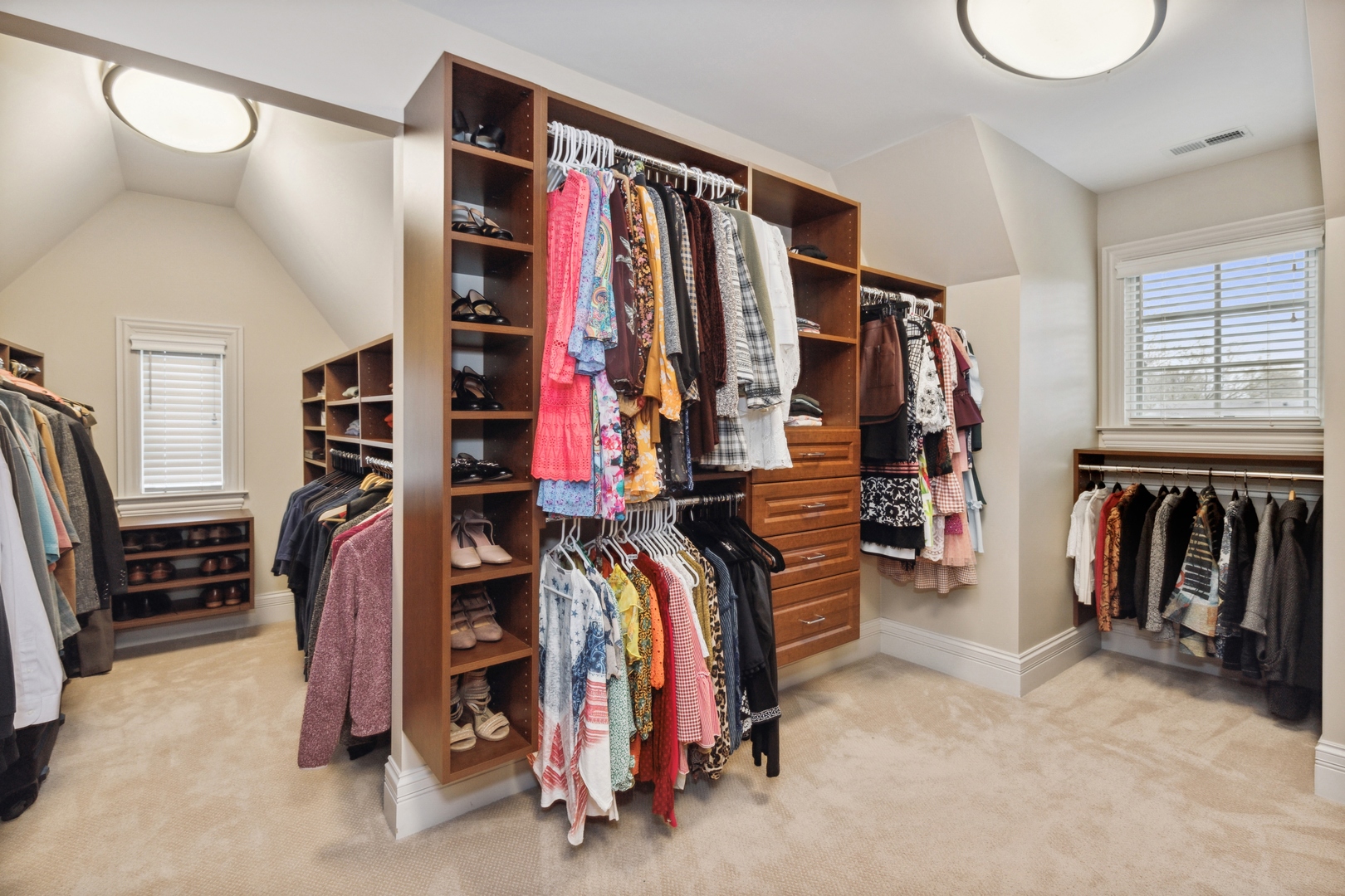 2770 Grace Road Northbrook, IL 60062 - Photo 24 of 51 a view of walk in closet with clothes and shoes