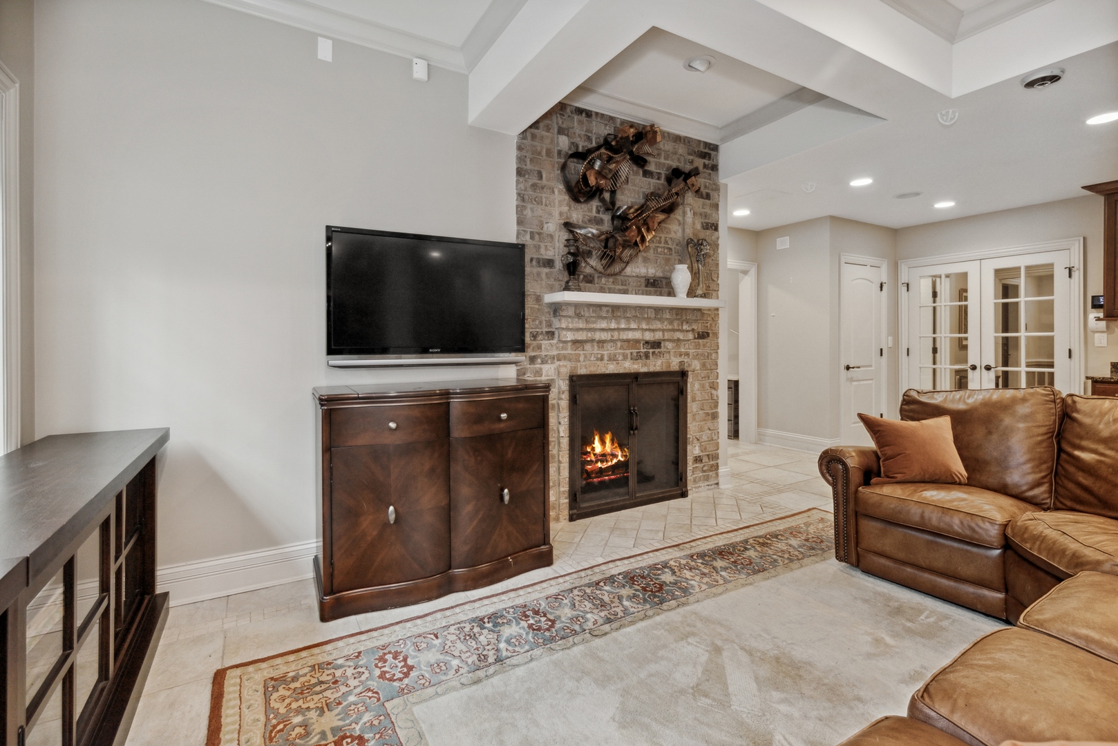 2770 Grace Road Northbrook, IL 60062 - Photo 33 of 51 a living room with furniture and a fireplace or television