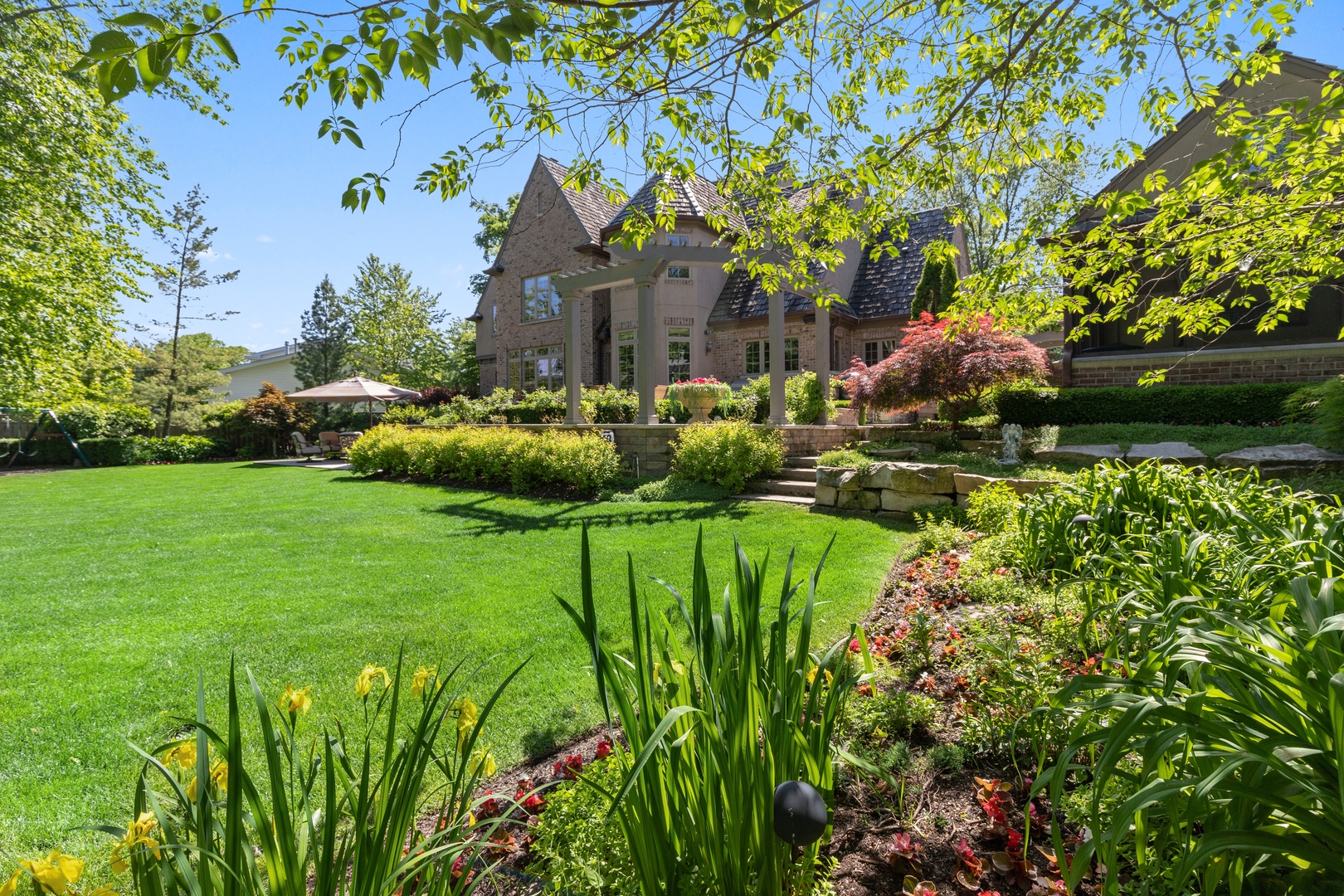 2770 Grace Road Northbrook, IL 60062 - Photo 45 of 51 a view of a garden with plants and large trees
