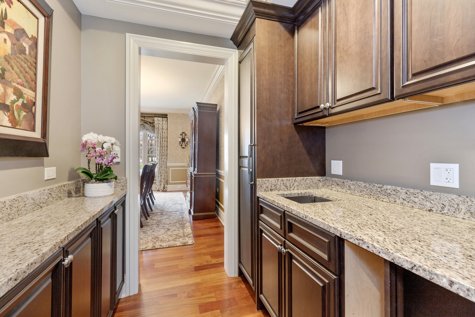 2770 Grace Road Northbrook, IL 60062 - Photo 9 of 51 a kitchen with granite countertop kitchen island stainless steel appliances a sink stove and refrigerator