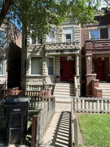 a view of a house with more windows and furniture