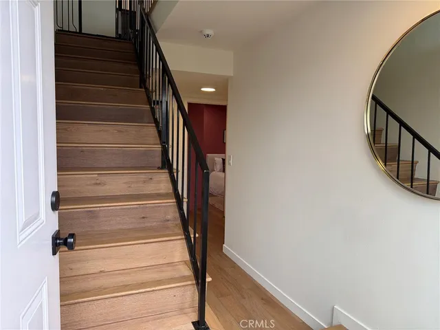 a view of entryway with wooden floor