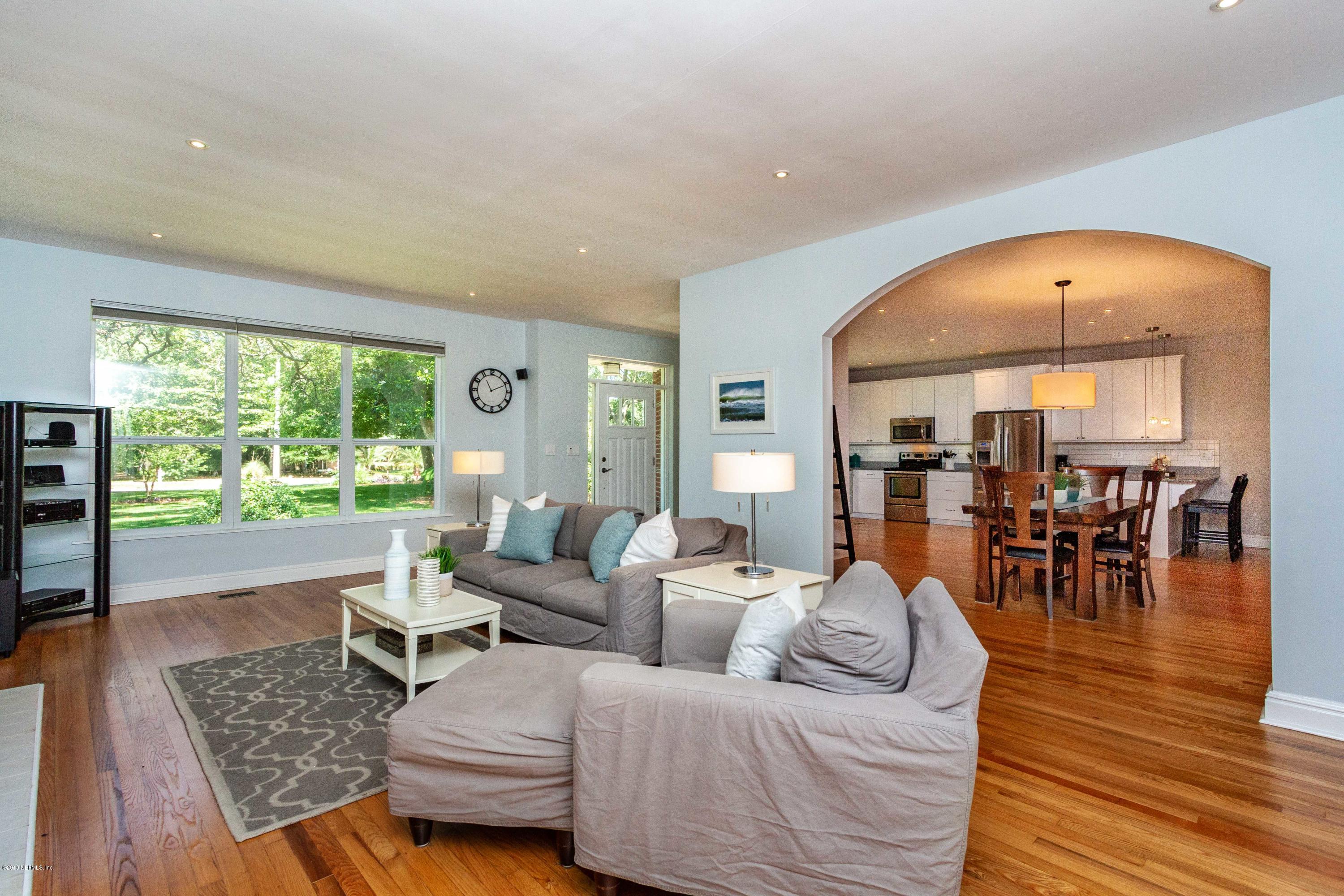 841 Penman Road Neptune Beach, FL 32266 - Photo 16 of 92 a living room with furniture and a large window