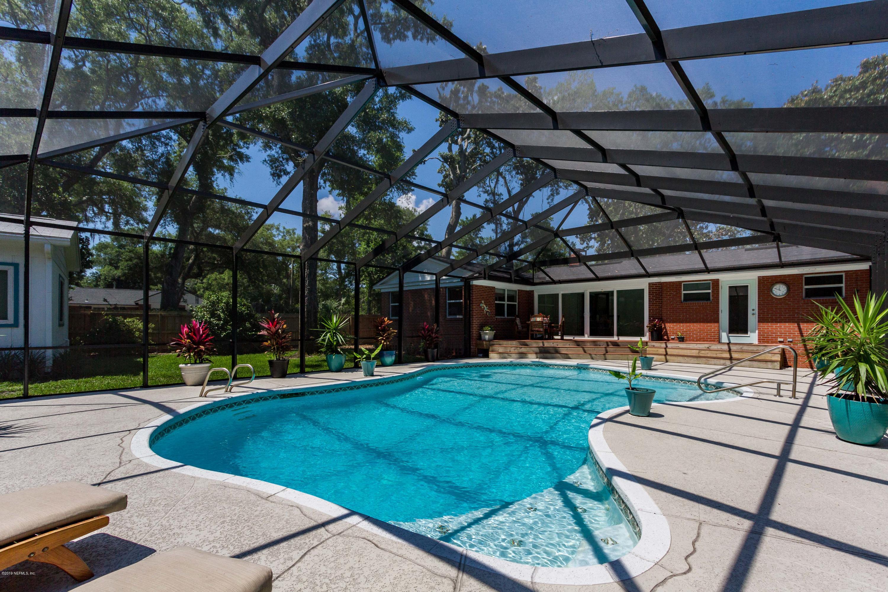 841 Penman Road Neptune Beach, FL 32266 - Photo 41 of 92 a view of a swimming pool with a patio