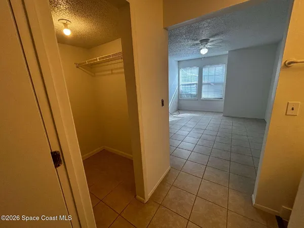 a view of a hallway with entryway