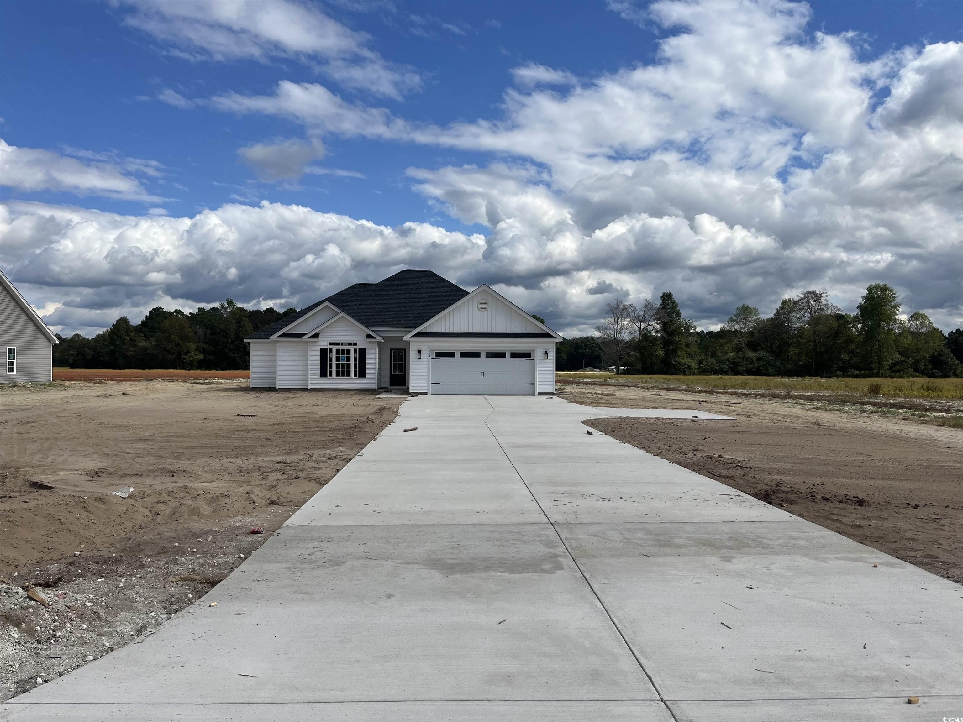 499 Highway 348 Loris, SC 29569 - Photo 4 of 27 View of front of property featuring a garage