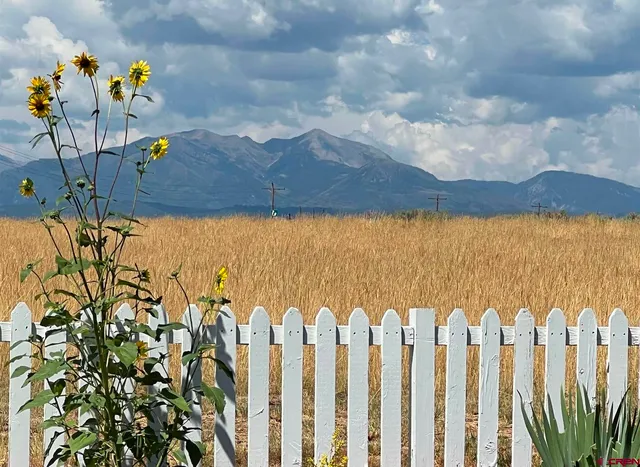 a view of a house with a mountain