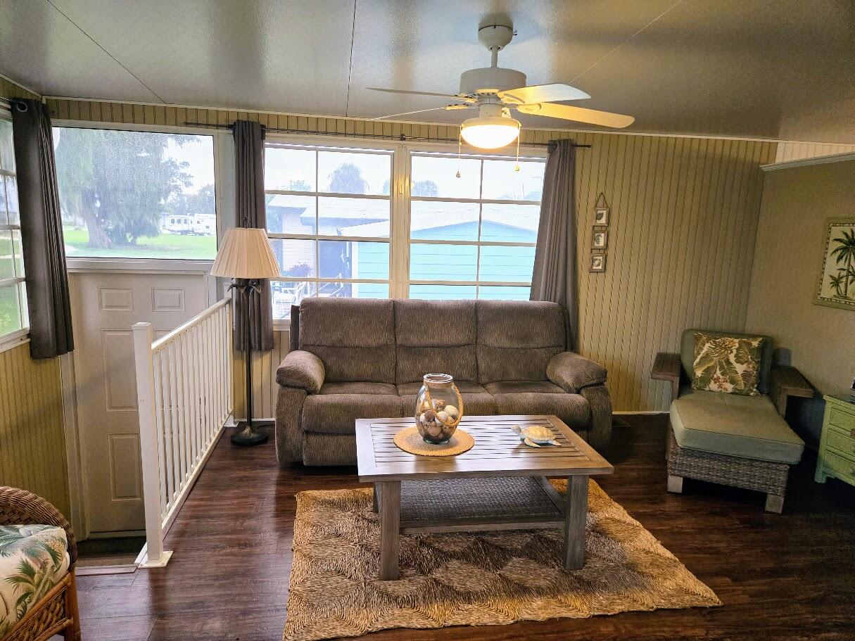 13680 Northwest 127th Terrace, Unit 17 Okeechobee, FL 34974 - Photo 2 of 30 a living room with furniture and a window
