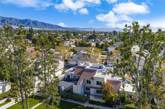 a view of a city with mountain