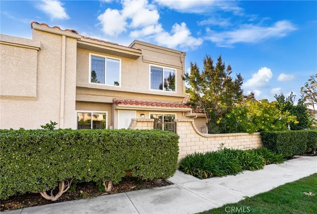a front view of a house having yard