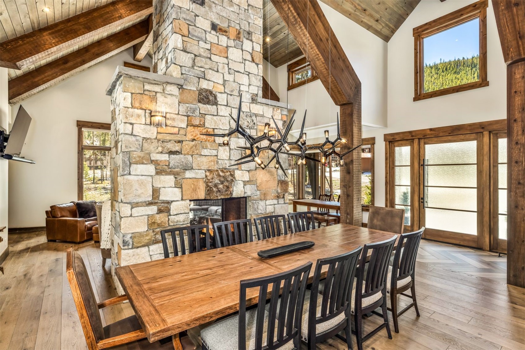 99 Independence Lane Keystone, CO 80435 - Photo 10 of 50 a dining room with furniture and wooden floor