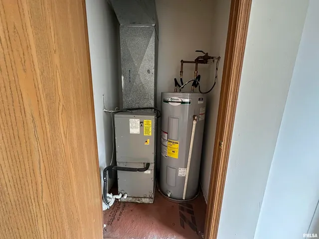 a view of water heater and storage