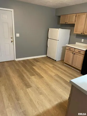 a view of a kitchen with a sink