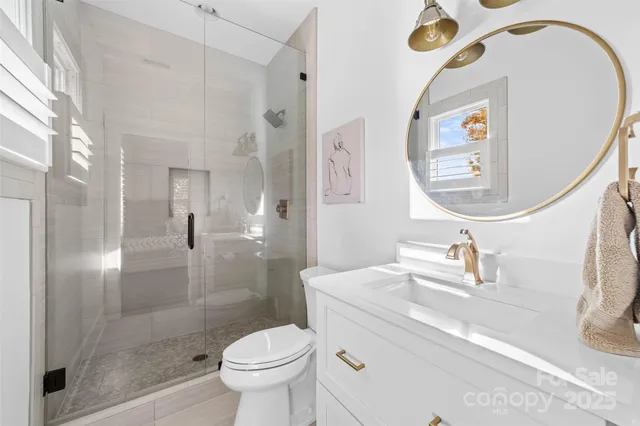 a living room with furniture or wooden floor and a chandelier