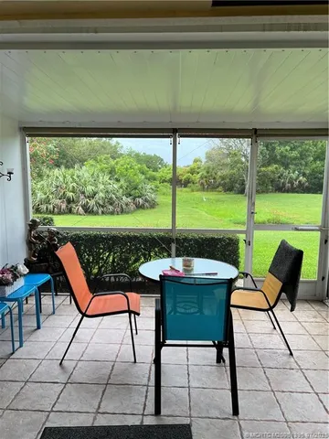 a view of a garden with an outdoor space