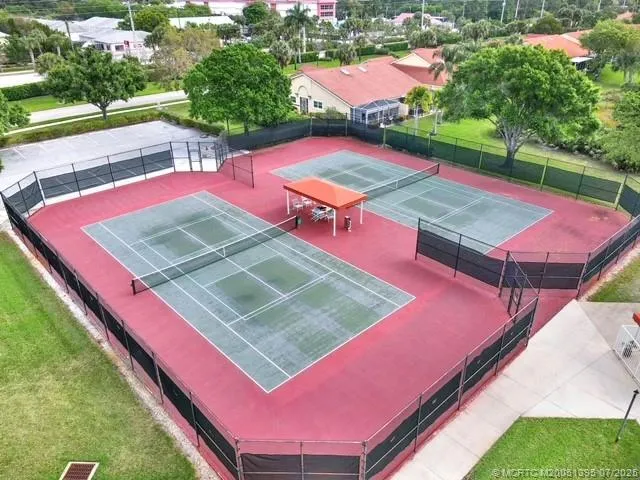 a sign that is on the side of the building