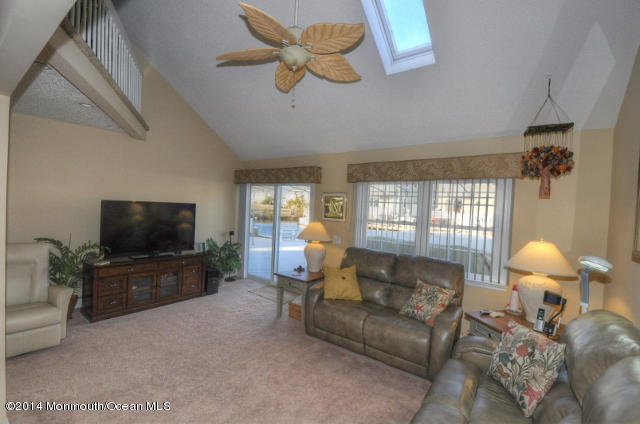 207 Allen Road Bayville, NJ 08721 - Photo 6 of 29 a living room with furniture and a flat screen tv