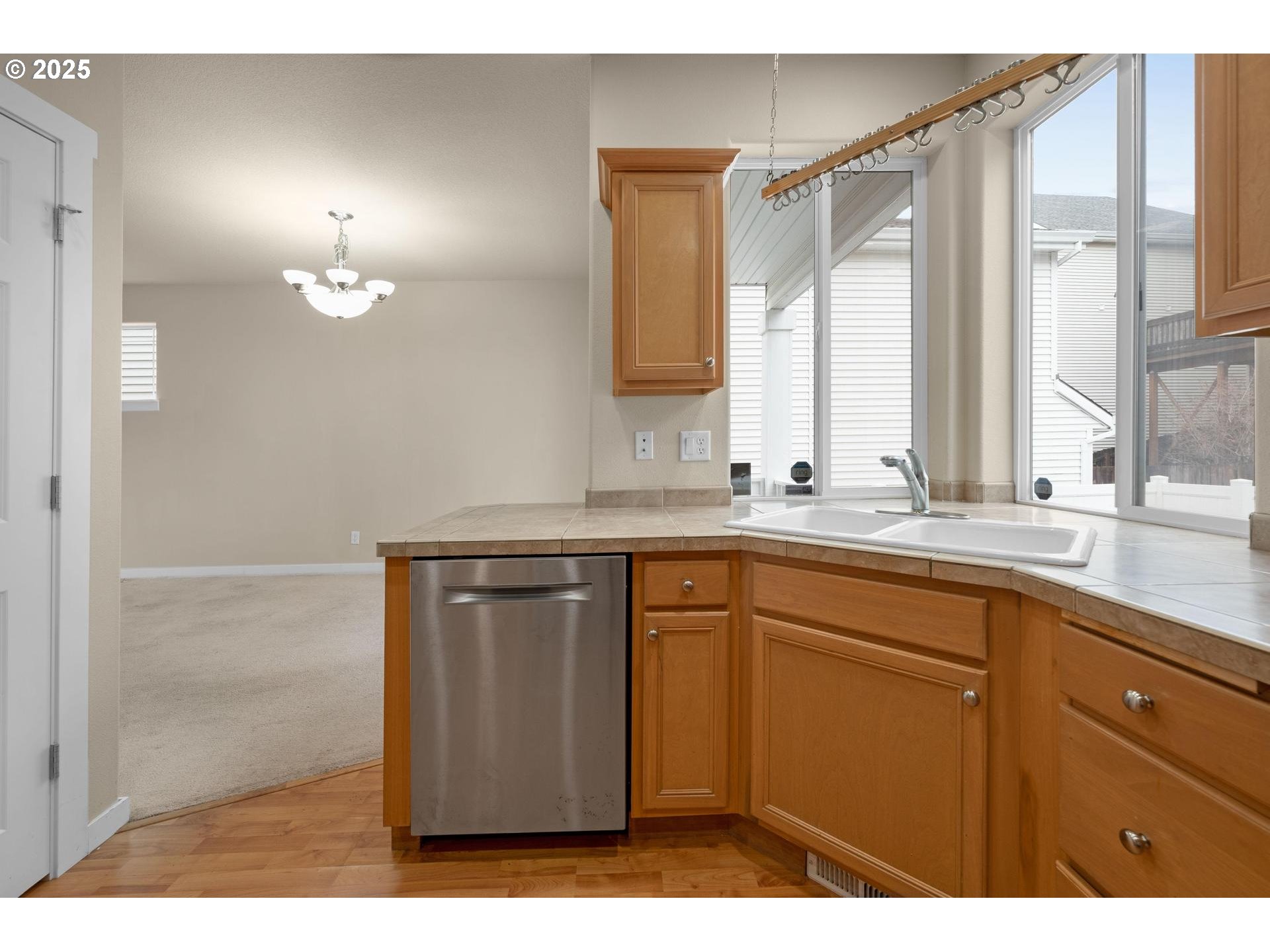 10797 Southwest Washington Street Portland, OR 97225 - Photo 15 of 48 a bathroom with a sink and a mirror