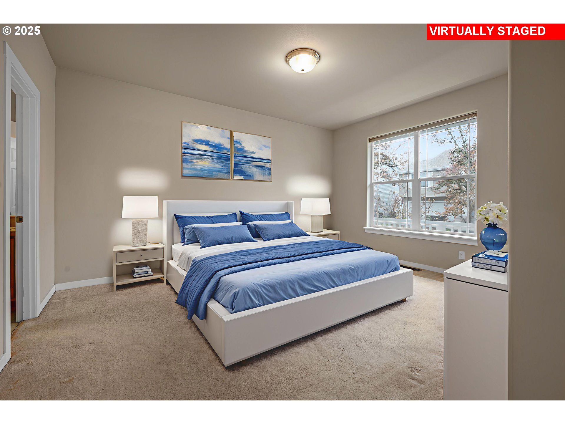 10797 Southwest Washington Street Portland, OR 97225 - Photo 17 of 48 a bedroom with a bed and a window