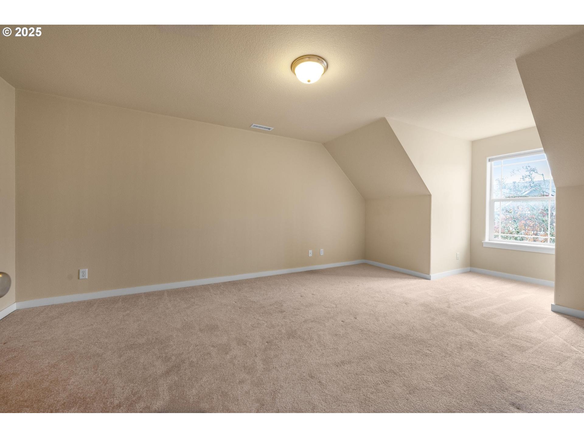10797 Southwest Washington Street Portland, OR 97225 - Photo 40 of 48 a view of an empty room with a window