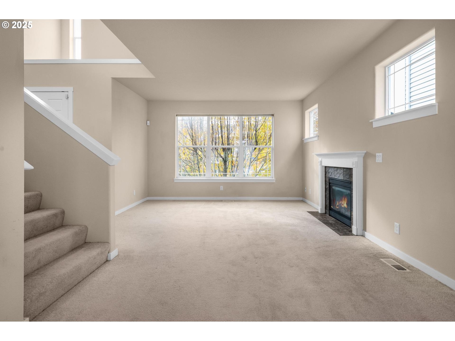 10797 Southwest Washington Street Portland, OR 97225 - Photo 5 of 48 a view of an empty room with a window