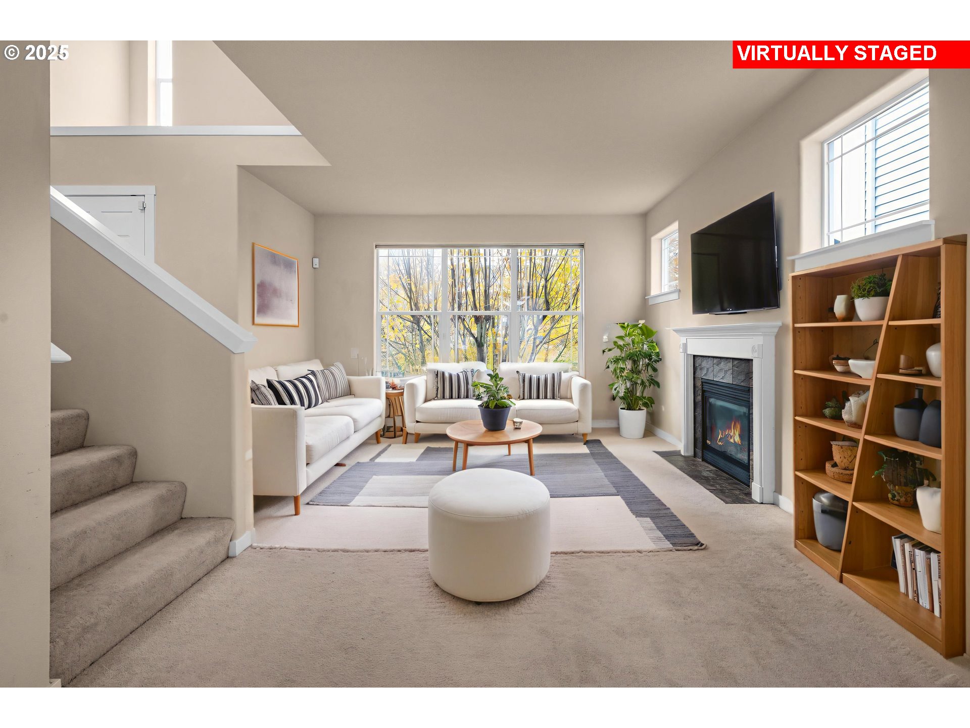10797 Southwest Washington Street Portland, OR 97225 - Photo 6 of 48 a living room with furniture and a flat screen tv