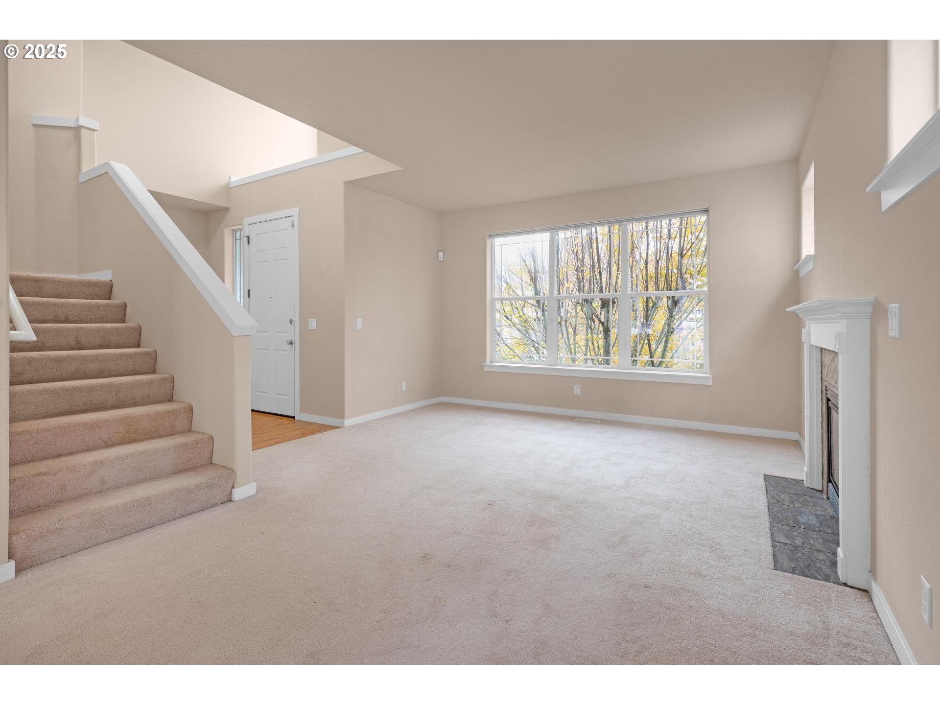 10797 Southwest Washington Street Portland, OR 97225 - Photo 7 of 48 a view of an empty room with windows