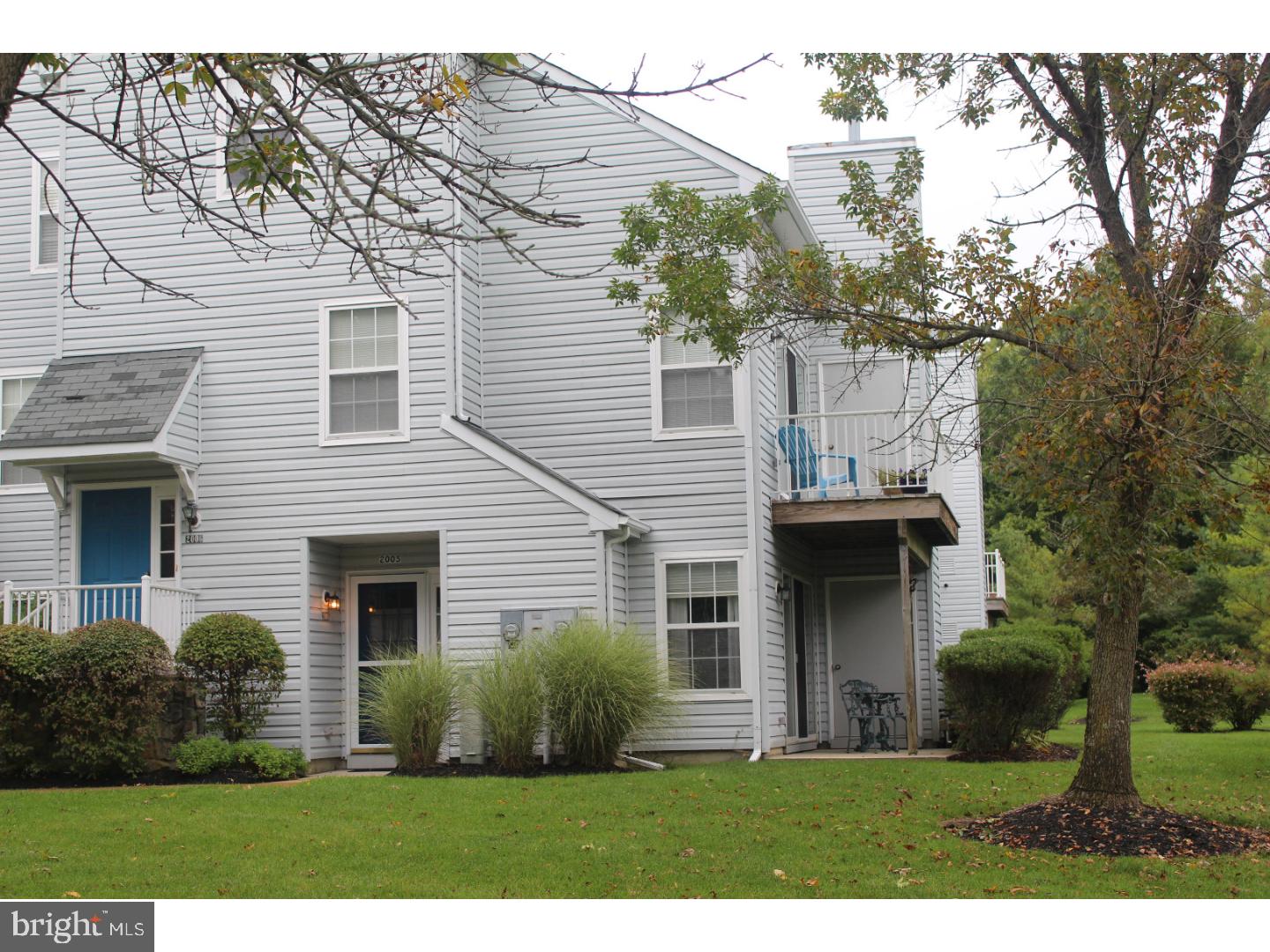 2005 Rabbit Run Road Marlton, NJ 08053 - Photo 1 of 17 a front view of a house with a garden and yard