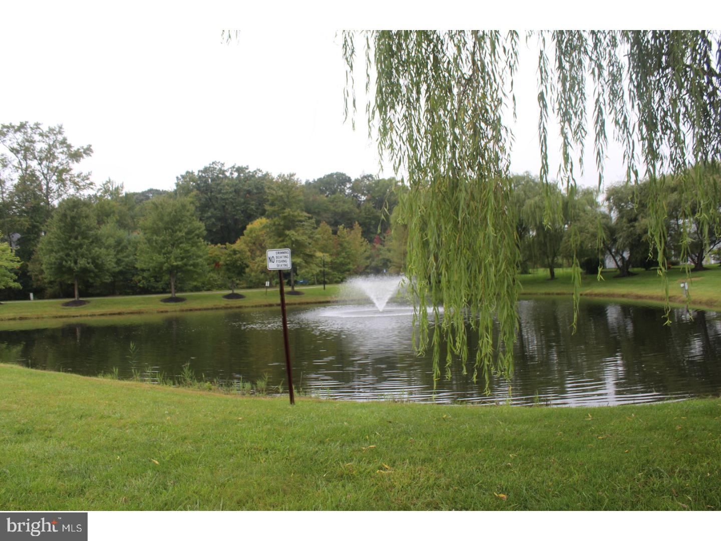 2005 Rabbit Run Road Marlton, NJ 08053 - Photo 14 of 17 a view of a water pond with green yard