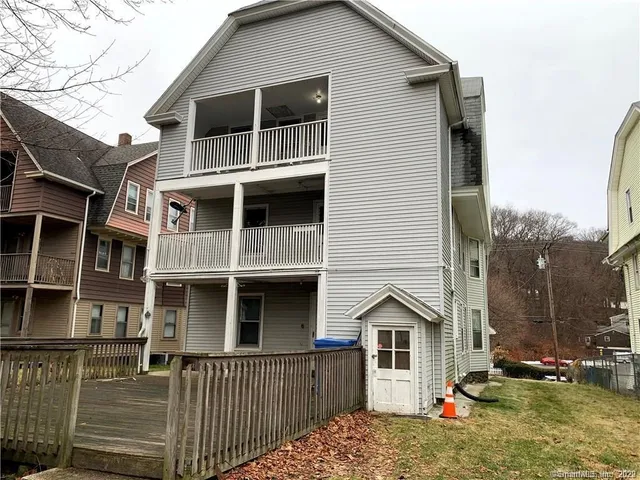 a front view of a house with a balcony