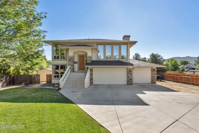 a view of a swimming pool with an outdoor seating