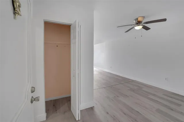 a view of a room with a wardrobe space