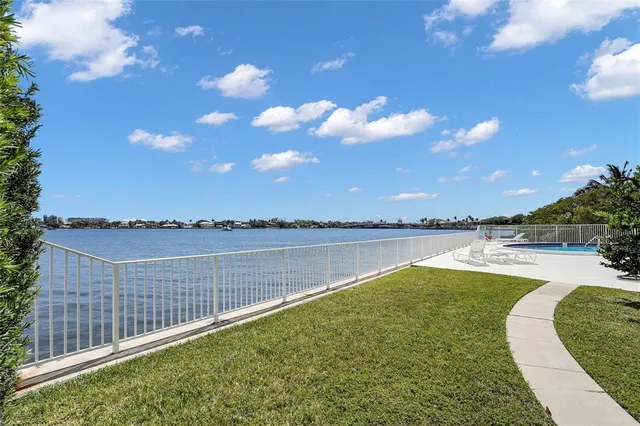 a view of a lake with a garden