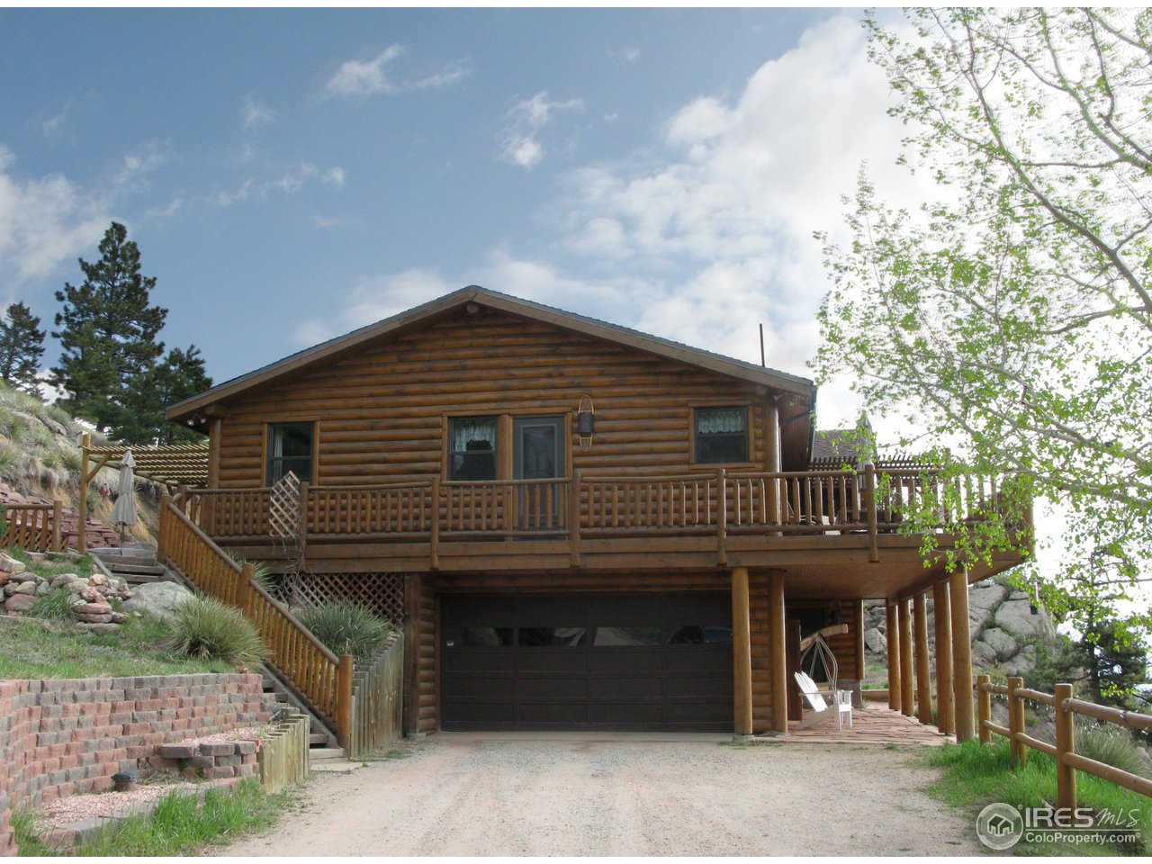 757 Brook Road Boulder, CO 80302 - Photo 7 of 18 a front view of a house with a garden