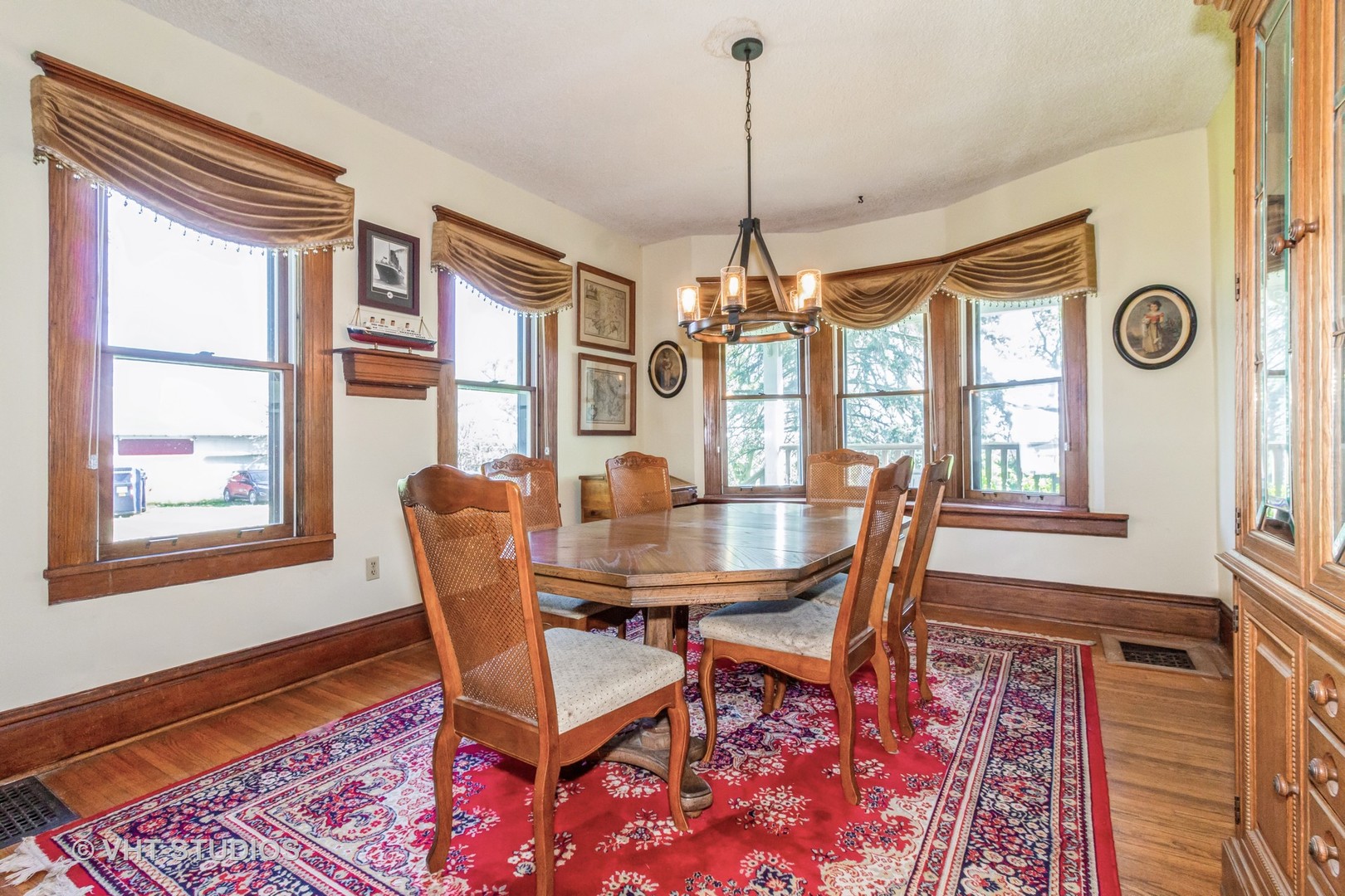 5S606 Davis Road Big Rock, IL 60511 - Photo 7 of 21 a dining room with furniture a chandelier and wooden floor