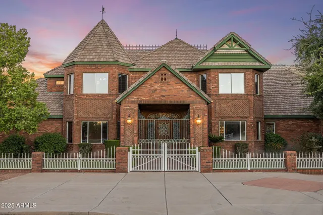 a view of a street with a building in the background