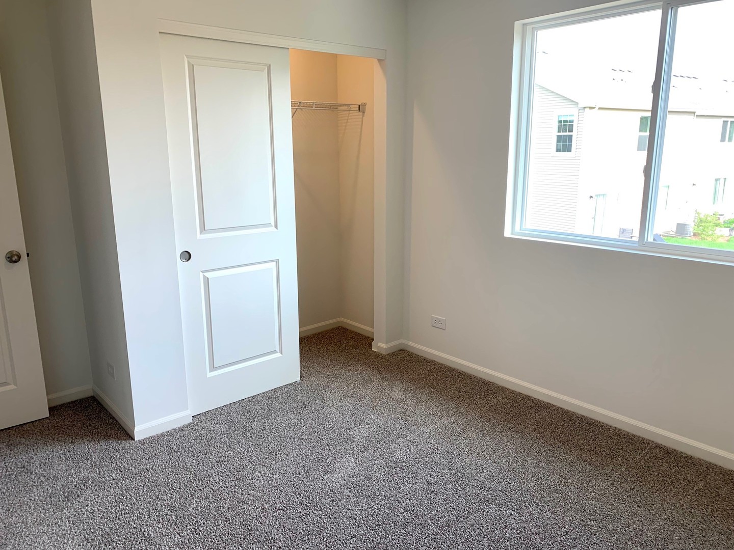 786 Westbury Drive Cary, IL 60013 - Photo 18 of 31 an empty room with windows and closet