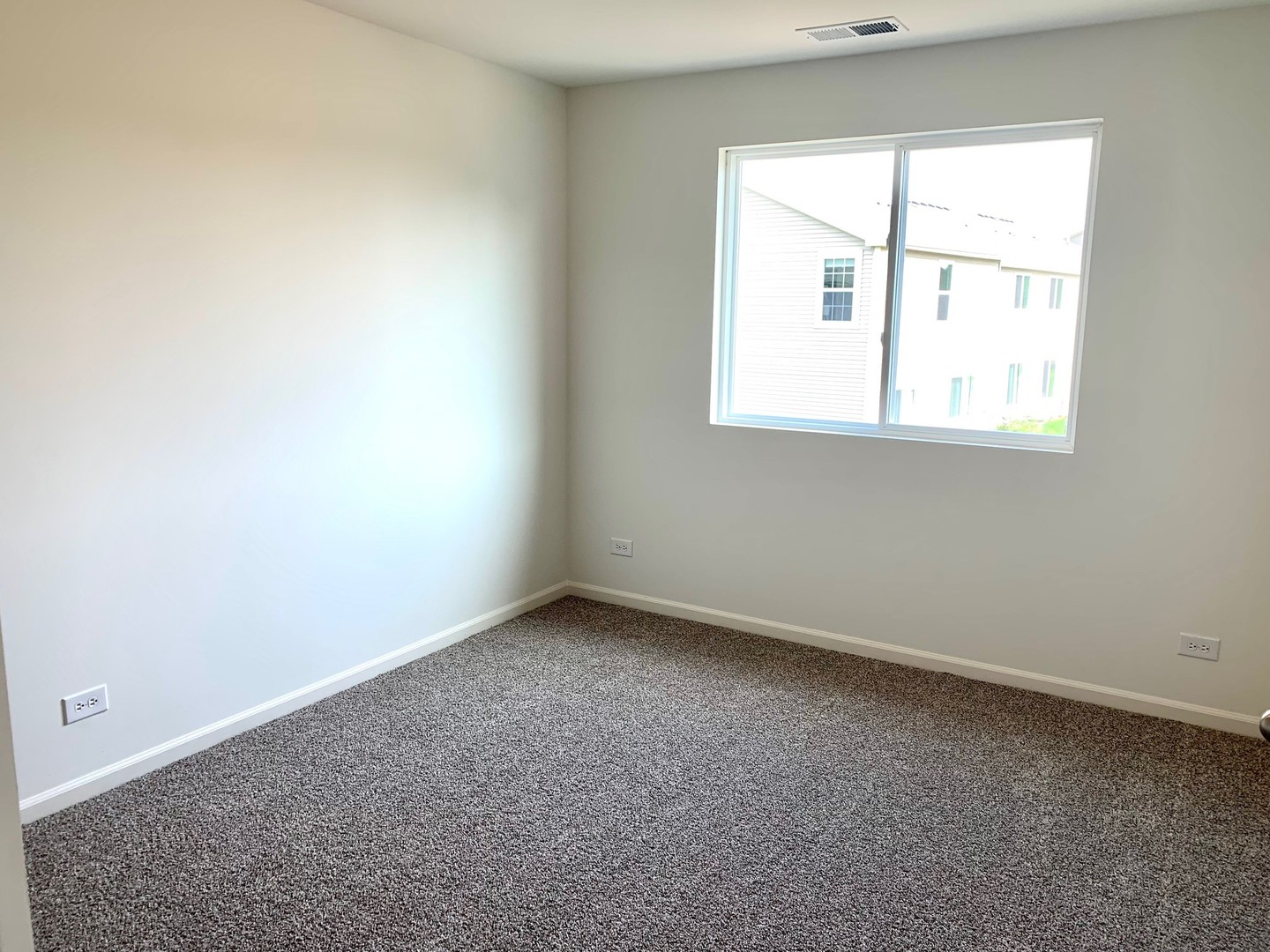 786 Westbury Drive Cary, IL 60013 - Photo 19 of 31 an empty room with a window