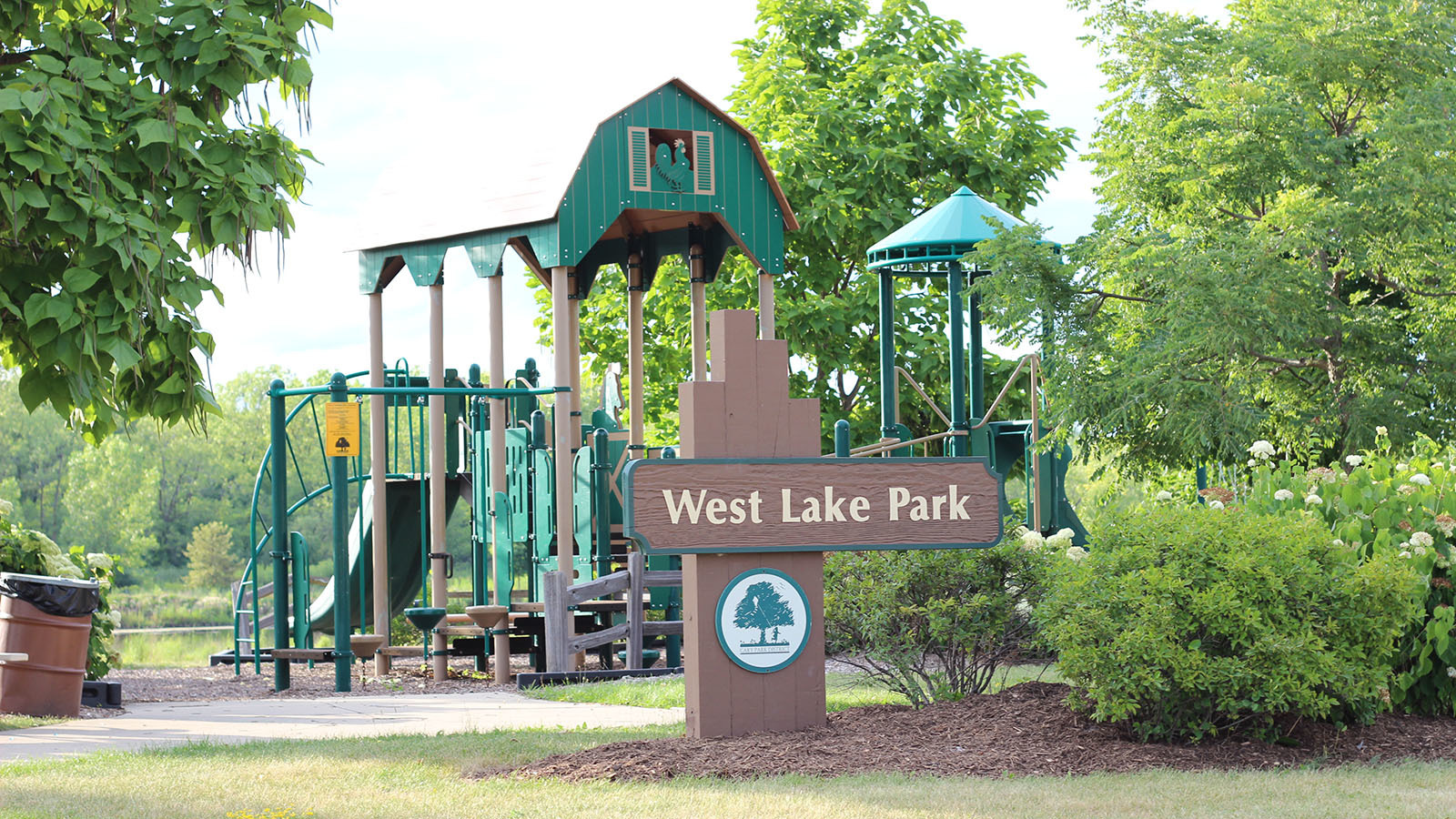 786 Westbury Drive Cary, IL 60013 - Photo 25 of 31 a front view of a building with garden and trees
