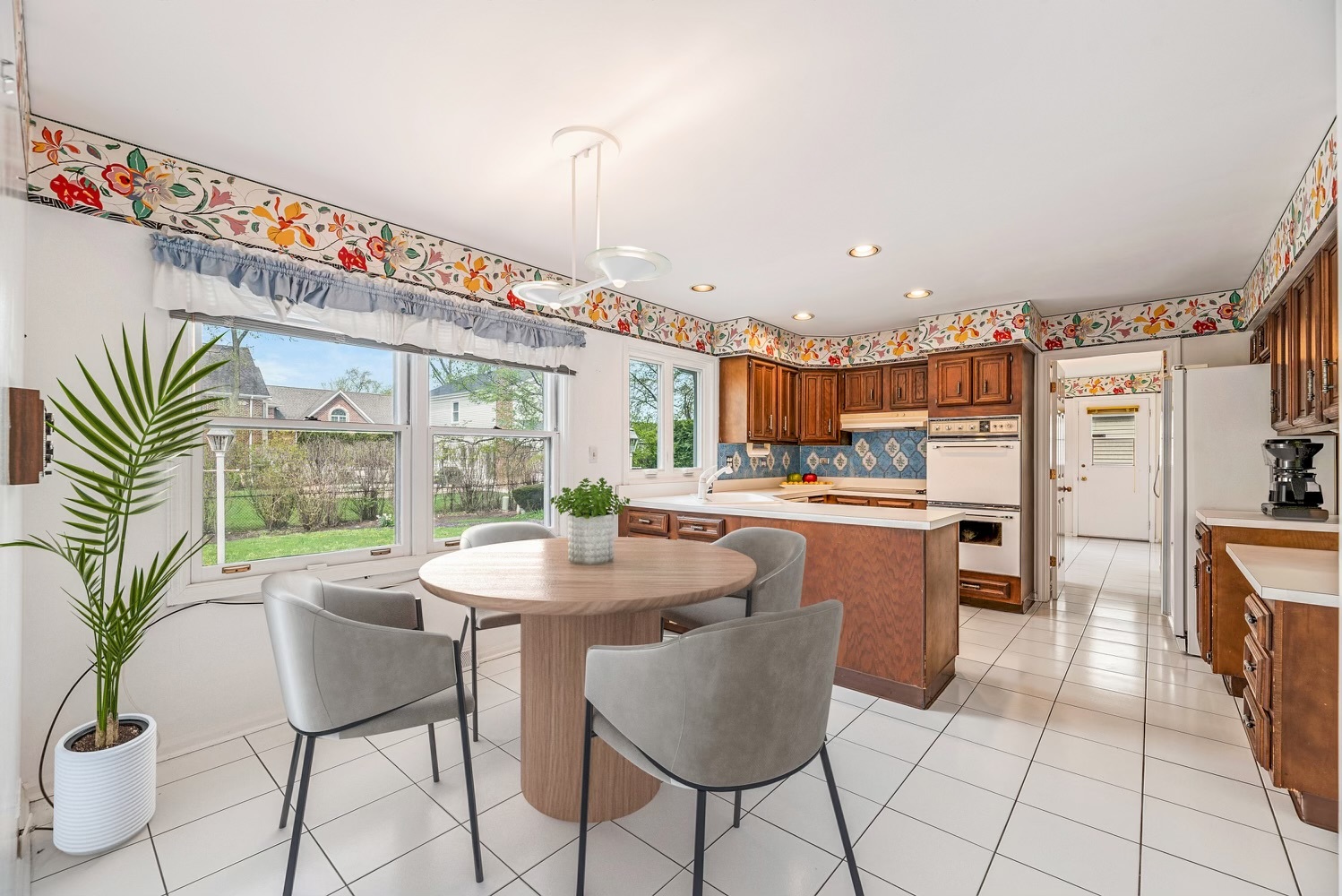 3210 Old Mill Road Northbrook, IL 60062 - Photo 11 of 41 a kitchen with a table and chairs
